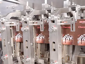 Envasadora de bolsas con boquilla (spout) por servo motor, llenado con 2 boquillas