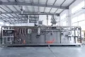 Envasadora horizontal de bolsas planas, llenado con 2 boquillas