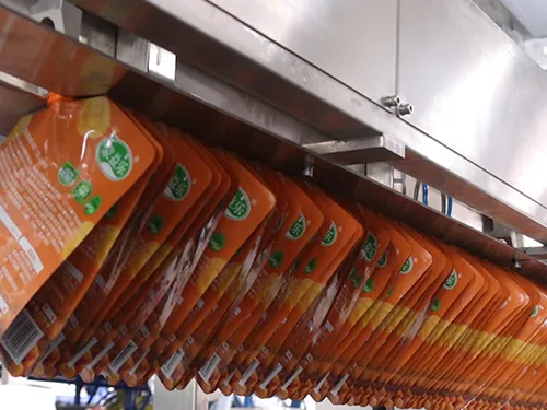 Llenadora y taponadora de bolsas con boquilla ZGY-4000